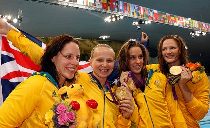 From left: Alicia Coutts, Melanie Schlanger, Brittany Elmslie and Cate Campbell pose with their gold medals after winning the women's 4x100m freestyle relay final. Image AAP/EPA From left: Alicia Coutts, Melanie Schlanger, Brittany Elmslie and Cate Campbell pose with their gold medals after winning the women's 4x100m freestyle relay final. Image AAP/EPA