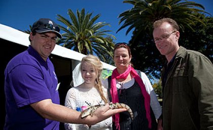 Scott Kershaw from UQ showing off a blue tongue lizard at the 2010 UQ Gatton Open Day