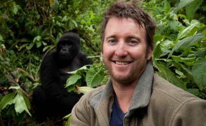 James Watson ... with a critically endangered mountain gorilla in east Africa. James Watson ... with a critically endangered mountain gorilla in east Africa.
