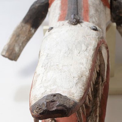 Crocodile (detail) by unknown artist (1958). Ochres and resin on wood. Collection of The University of Queensland Anthropology Museum