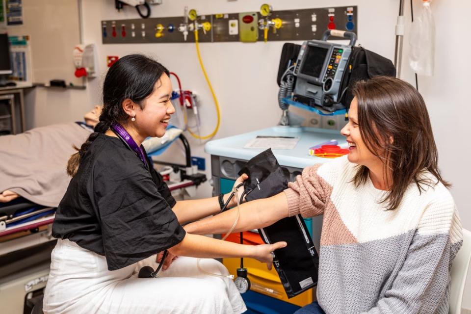First-year medical student Estella Le carrying out patient care.